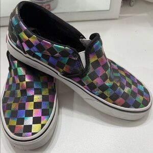 Vans Slip-On Sneakers in Black with Iridescent Rainbow Checkerboard